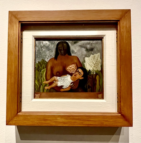 Painting of a nurse with baby Frida. Part of the Frida Kahlo Exhibit Houston