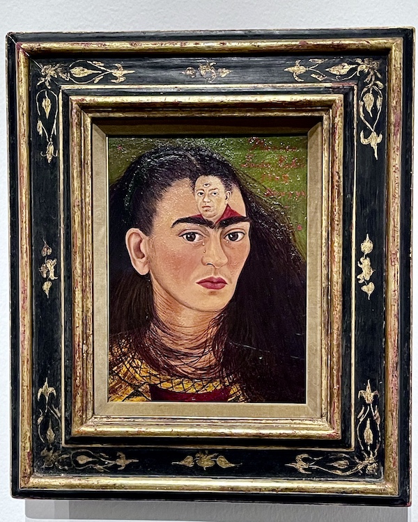 Portrait of Frida with face of Diego on her forehead. Part of the Frida Kahlo Exhibit Houston