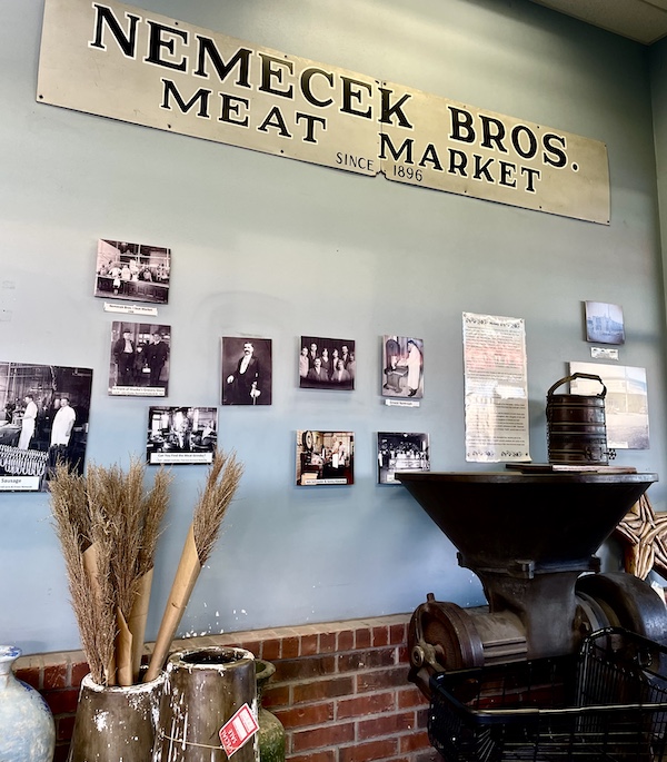 Wall with photos displayed at entrance of Slovacek's in West Texas