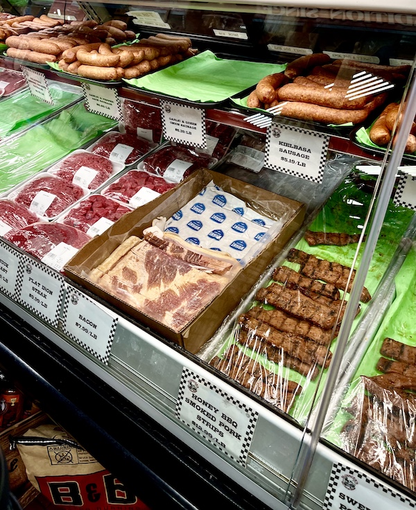 Deli case filled with sausages and other meat at Slovacek's in West Texas