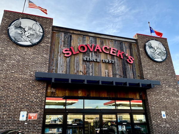 Brick and wood storefront of Slovacek's in West Texas
