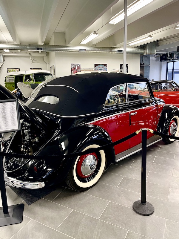 Red and black VW Beetle convertible with top up at DFW Car and Toy Museum