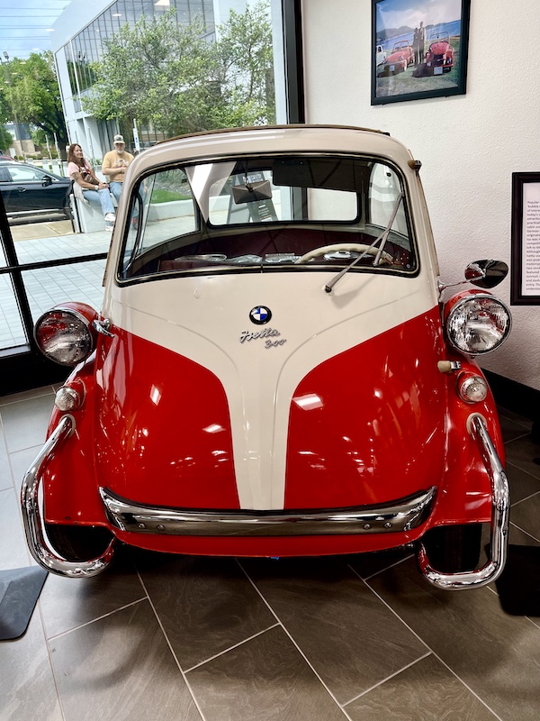 Very small red and white BMW car at DFW Car and Toy Museum