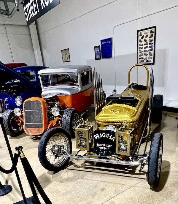 A couple of novelty cars on display at DFW Car and Toy Museum
