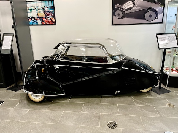 Small black car with chrome trim at DFW Car and Toy Museum