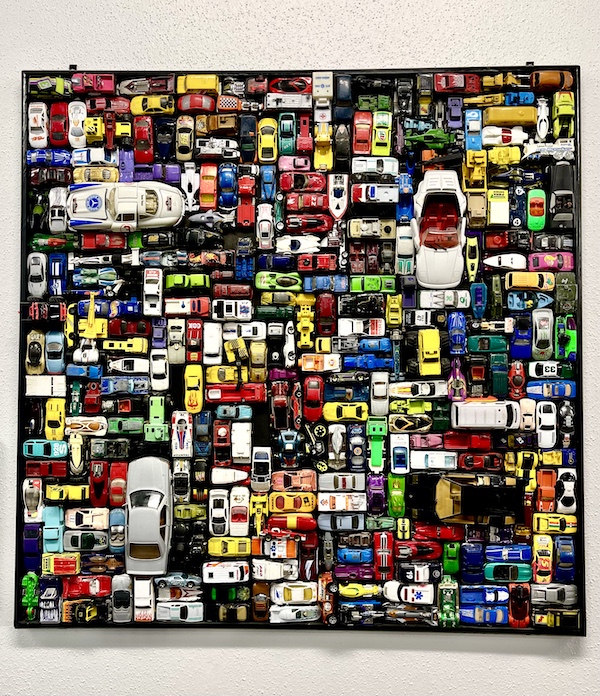 Collage of small toy cars on display at DFW Car and Toy Museum