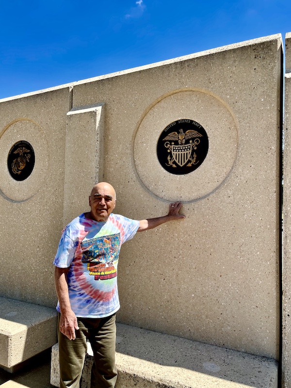 Steve standing under the Navy insignia at Indian Springs Park Waco Texas
