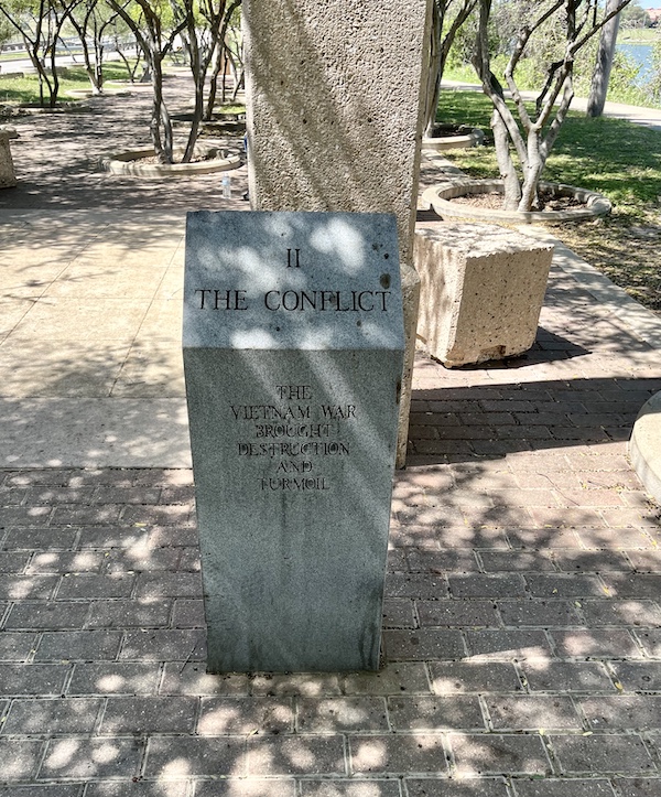 Gray stone monument to the Vietnam War conflict at Indian Springs Park Waco Texas
