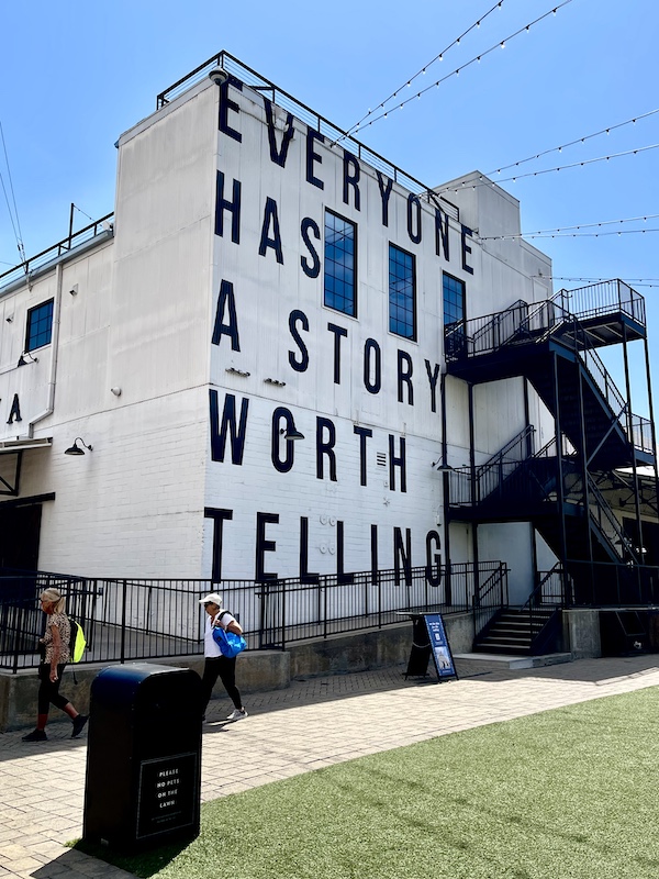 White building with black metal steps leading to multiple floors at The Silos Waco Texas