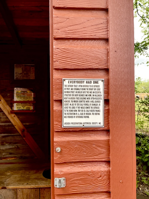 Outhouse on path to the Arcadia Round Barn Oklahoma