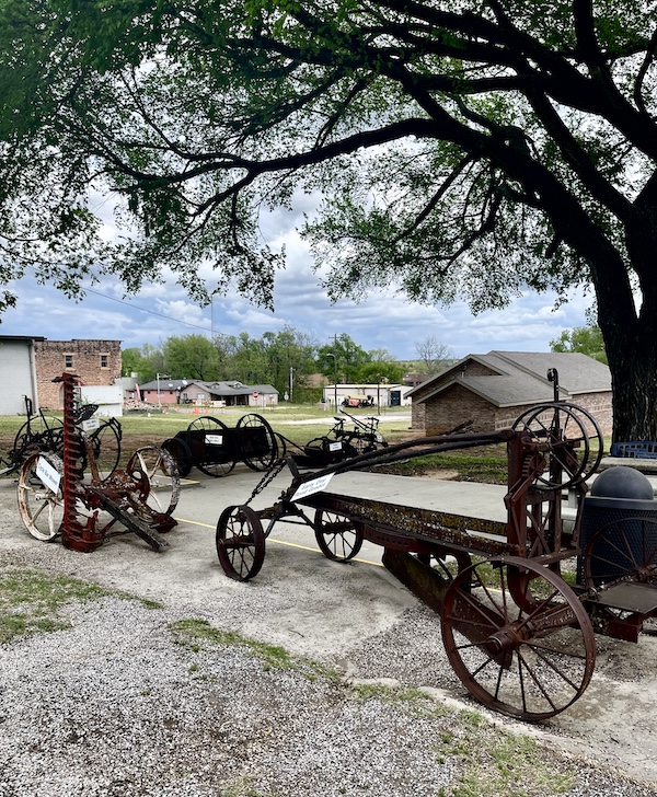 Several pieces of antique farm equipment at Arcadia Round Barn Oklahoma