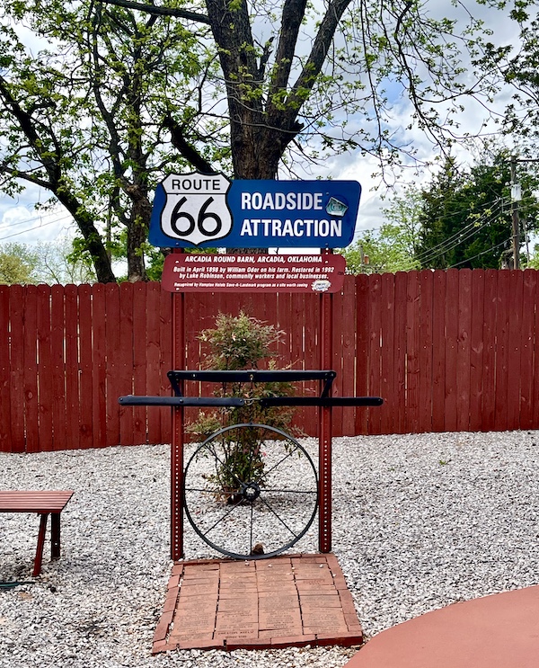 Sign in gravel welcoming you to Arcadia Round Barn Oklahoma.