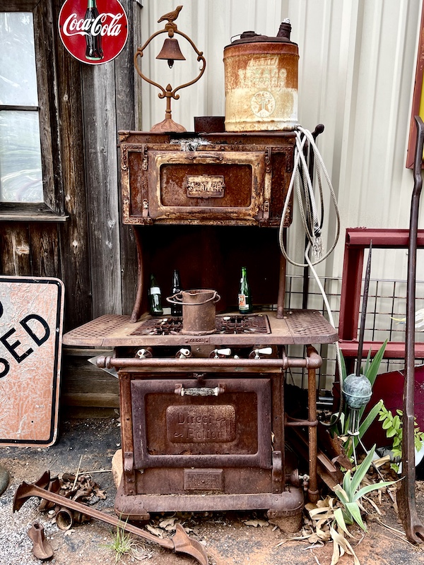 Rusty antique stove sitting outside of John's Place Arcadia Oklahoma