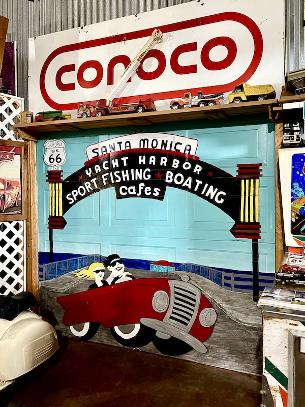 Old billboard for the ending location of Route 66 in Santa Monica CA at John's Place Arcadia Oklahoma