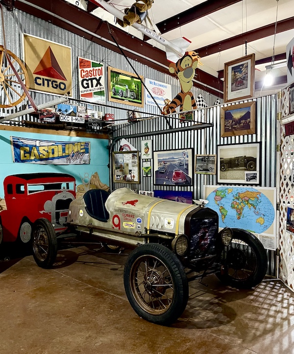 Gold antique racing car on display inside John's Place Arcadia Oklahoma