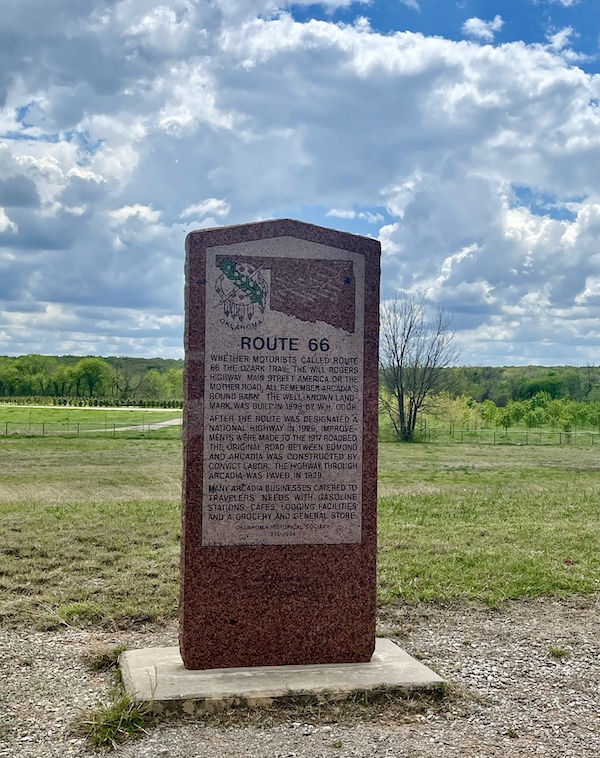 Red stone monument to historic Route 66 near Pops Route 66 Arcadia Oklahoma