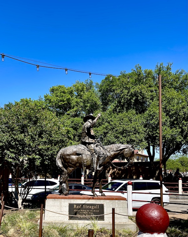 Bronze sculpture of cowboy Red Steagall at The Stockyards Fort Worth Texas