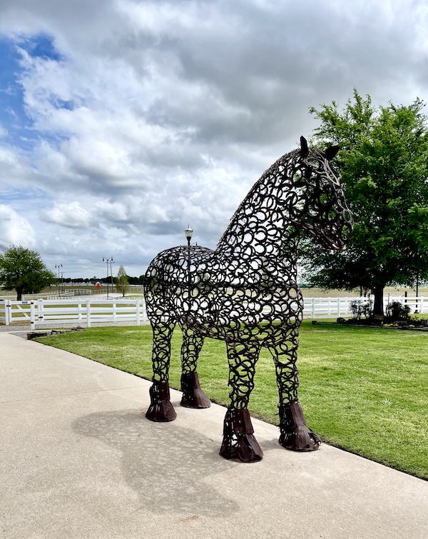 Statue of a clydesdale entirely made of horseshoes at Express Clydesdales Yukon Oklahoma
