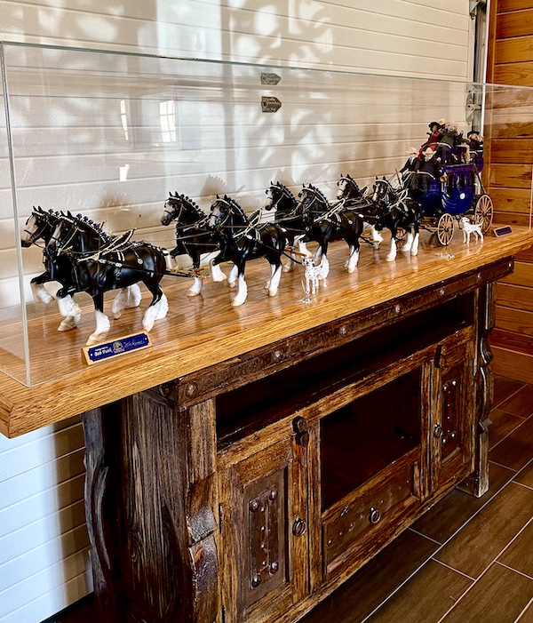 Sculpture on display of a carriage and team of 8 horses at the Express Clydesdales Yukon Oklahoma