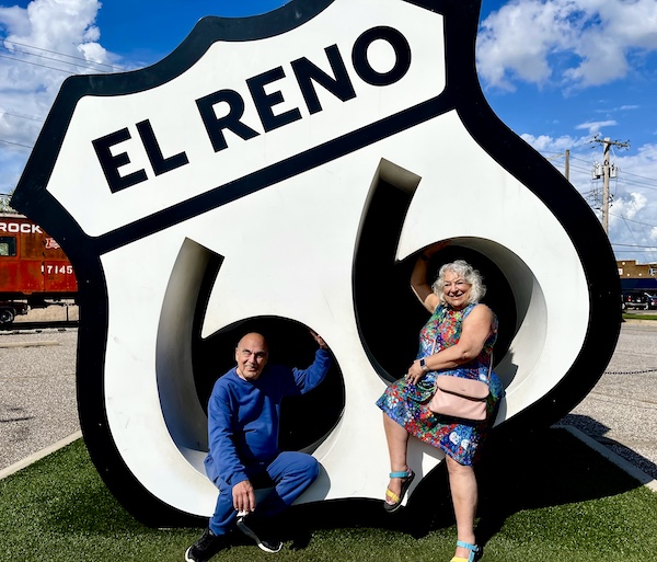 Happy 100 Route 66! Steve and I each sitting in one of the 6s of the El Reno Route 66 sign.