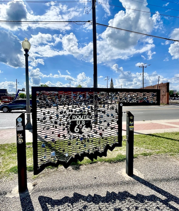 Happy 100 Route 66! Chain link map of Oklahoma filled with padlocks.